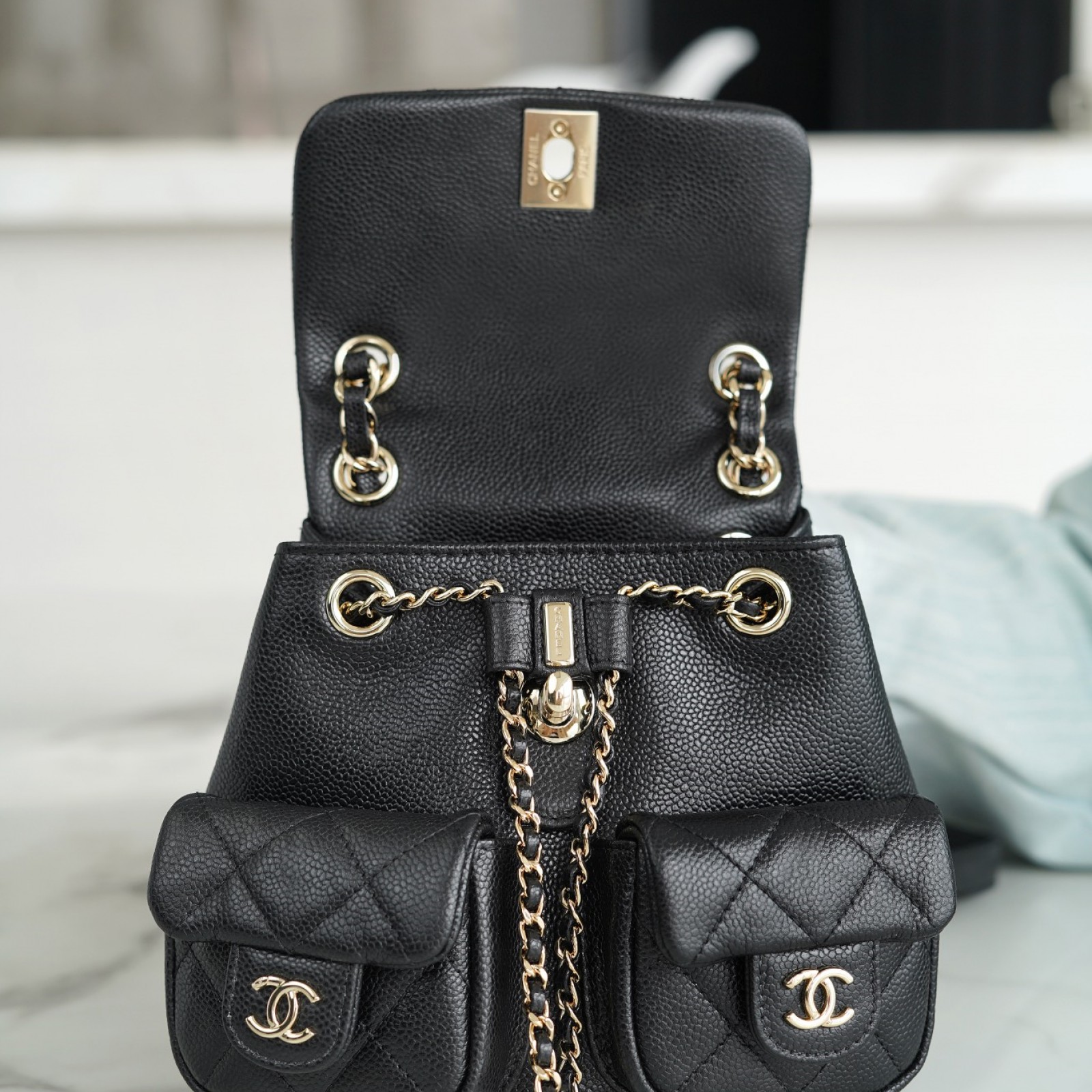 CHANEL MINI DUMA POCKETS DRAWSTRING BACKPACK  